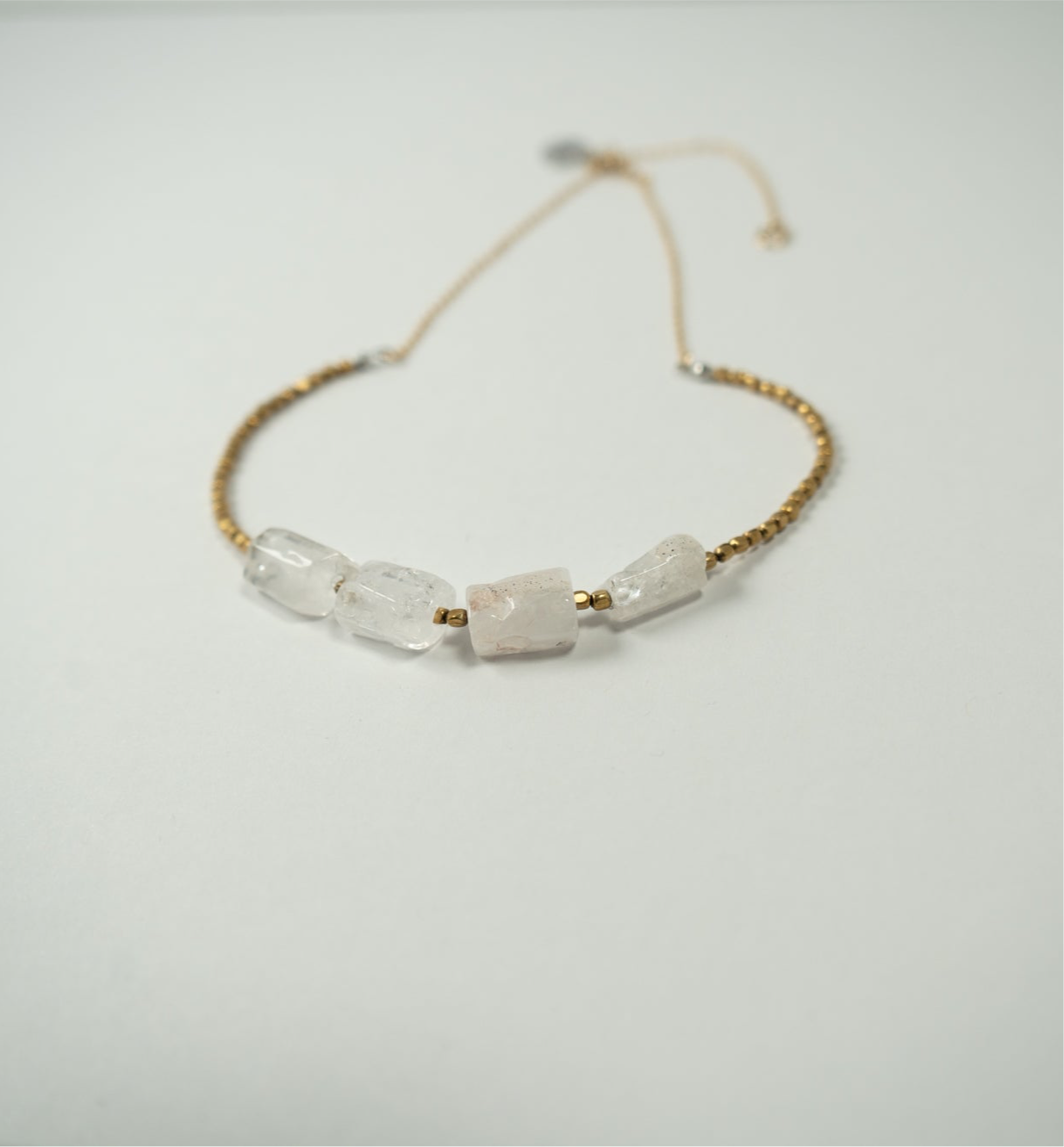Hexagonal crystal with metal beads necklace