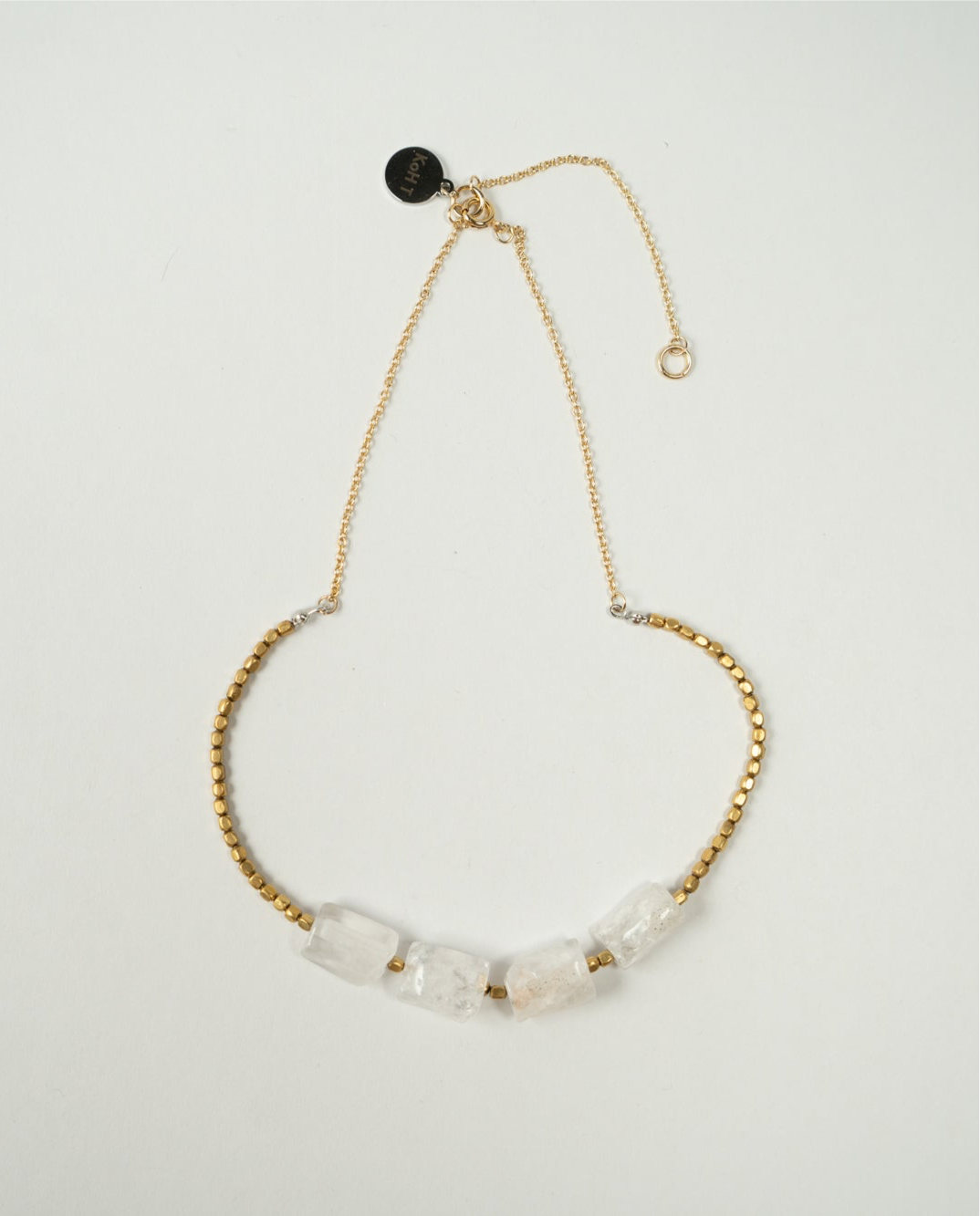 Hexagonal crystal with metal beads necklace