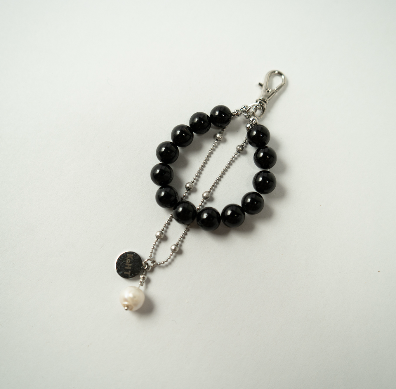 Black tourmaline and twin pearl strap