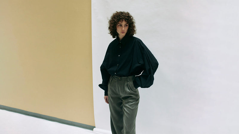 A volume sleeve blouse leads to a natural yet striking style