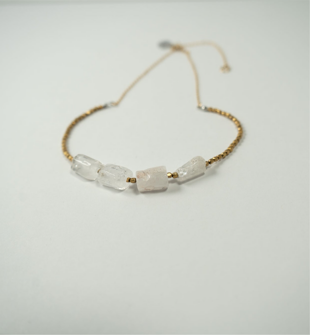 Hexagonal crystal with metal beads necklace