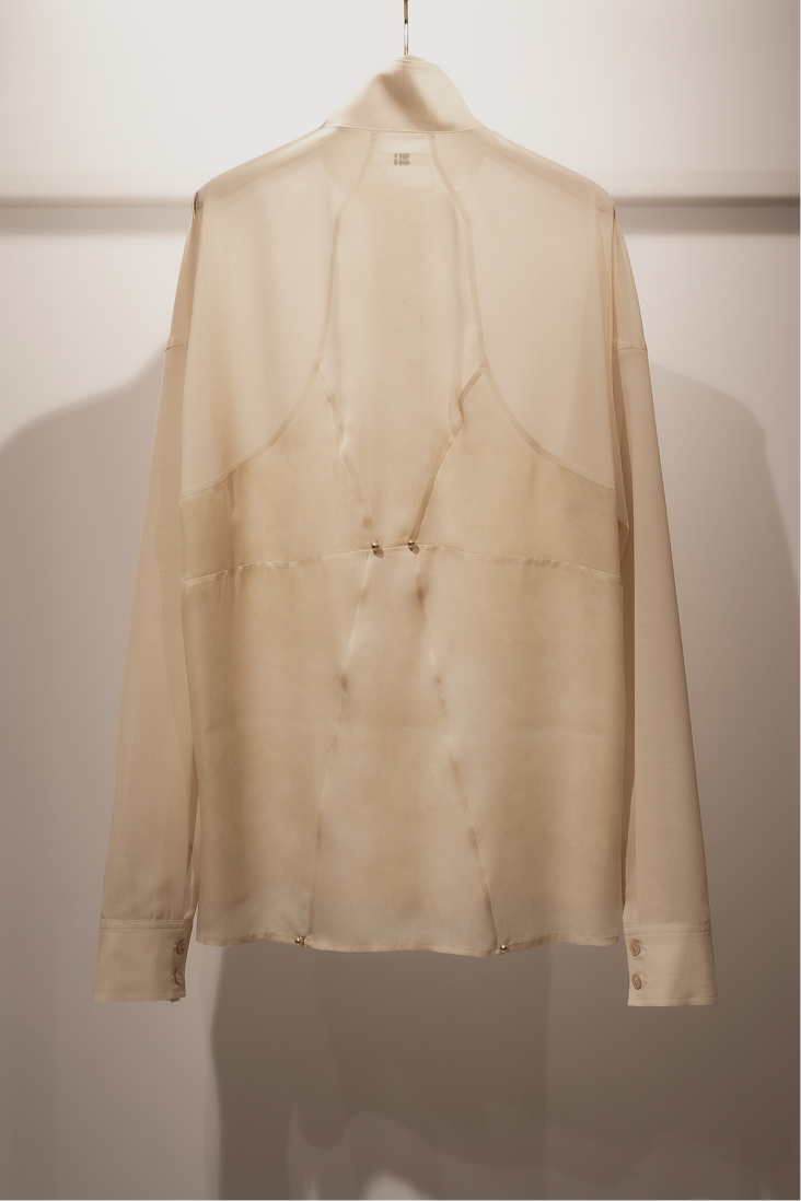 Corset style back switched blouse