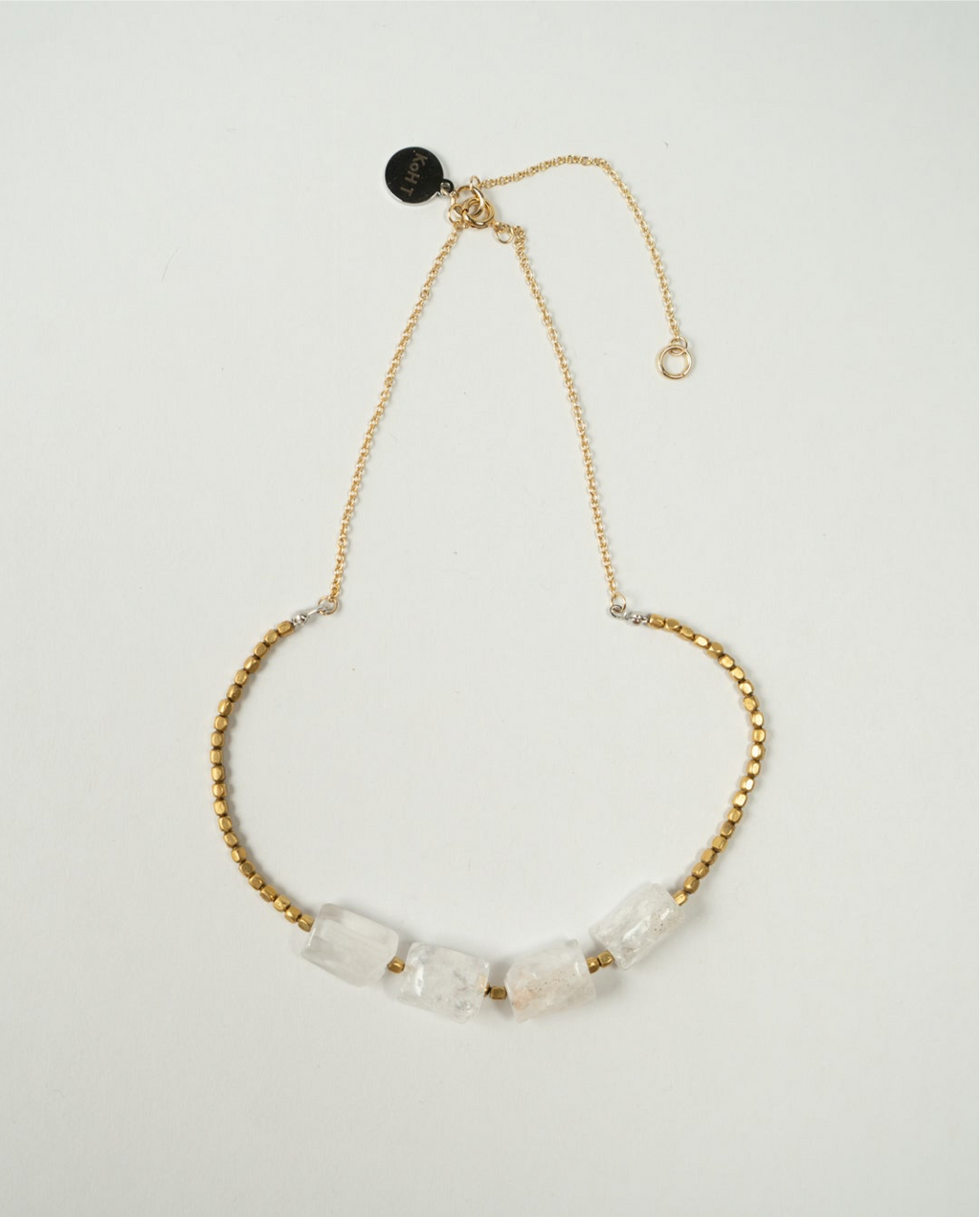 Hexagonal crystal with metal beads necklace