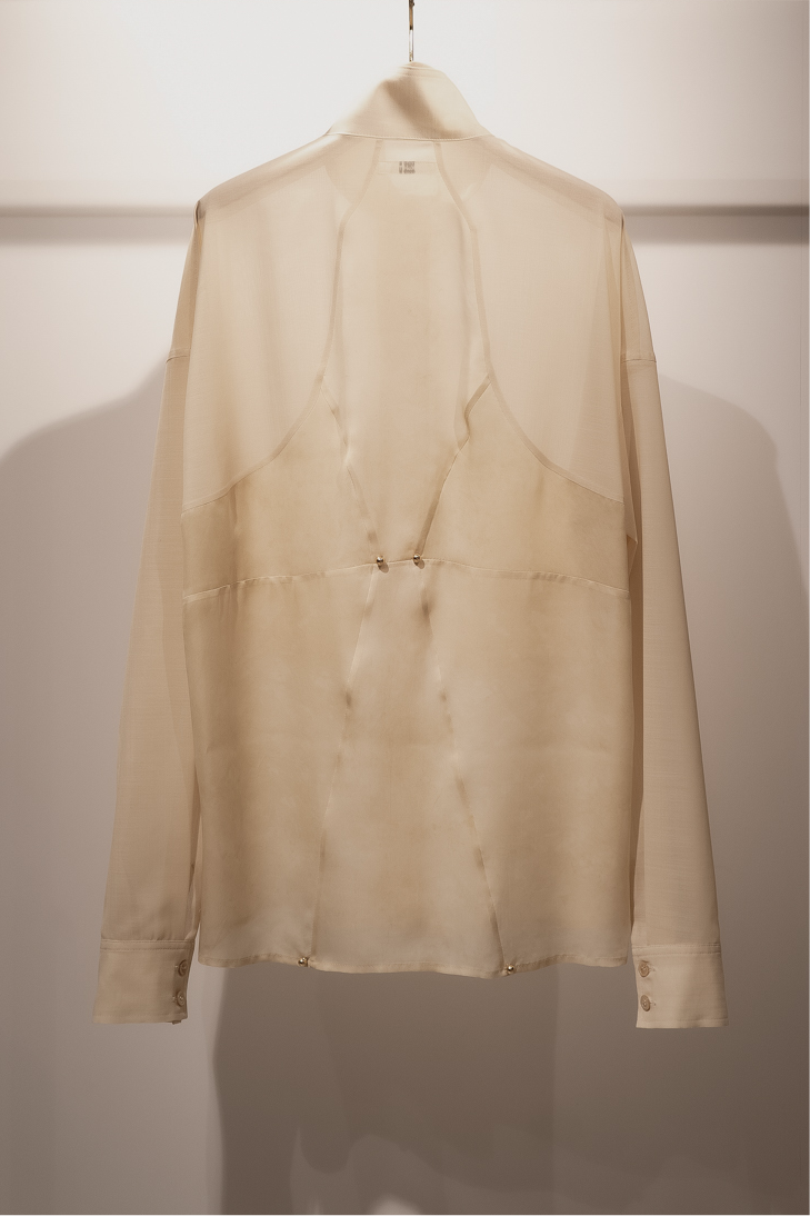 Corset style back switched blouse