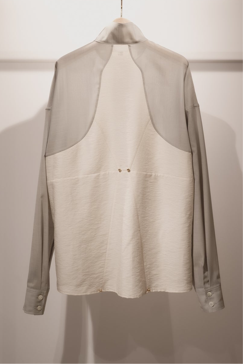 Corset style back switched blouse