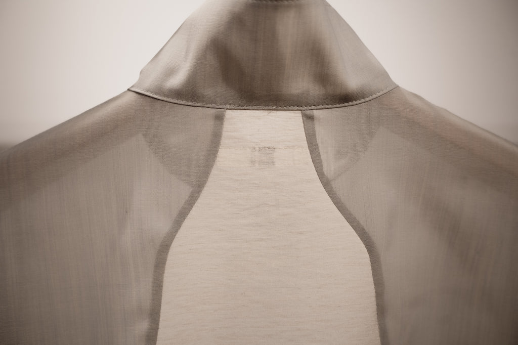 Corset style back switched blouse