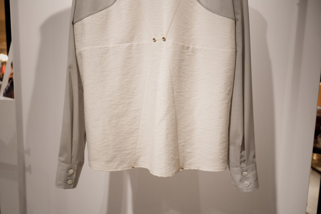 Corset style back switched blouse