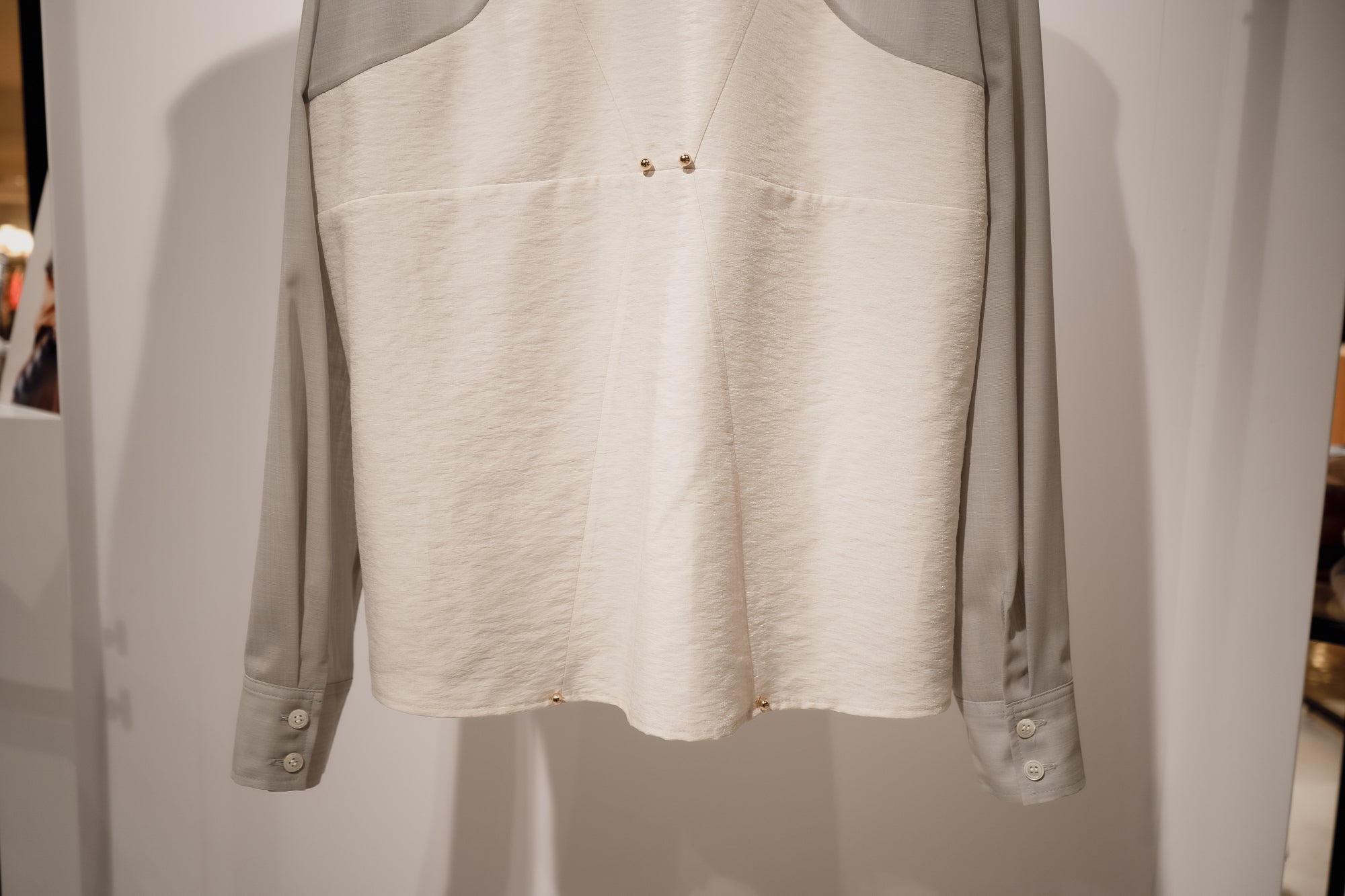 Corset style back switched blouse