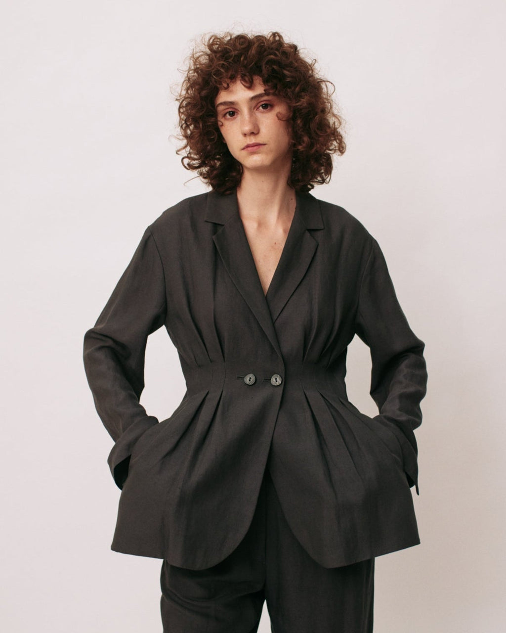Double-breasted tailored tuck jacket